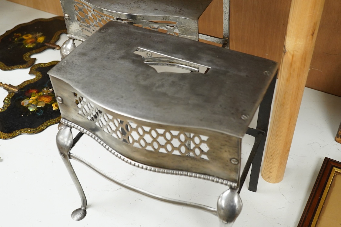 Two late Georgian pierced steel footman, 29cm high